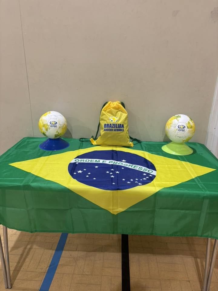 Girl controlling the football while playing at Brazilian Soccer Schools football training classes 